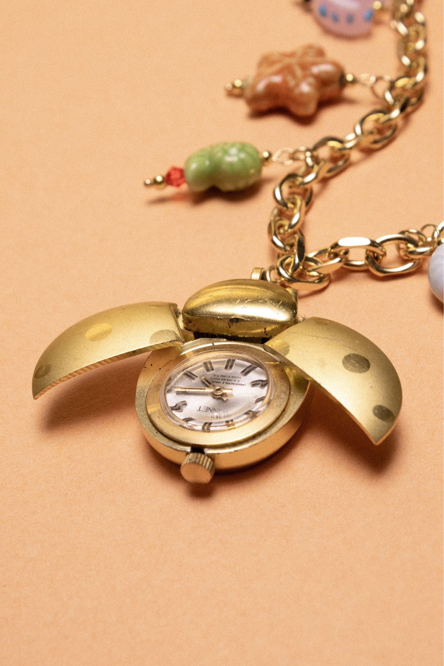 Buzzing Watch Charm Necklace