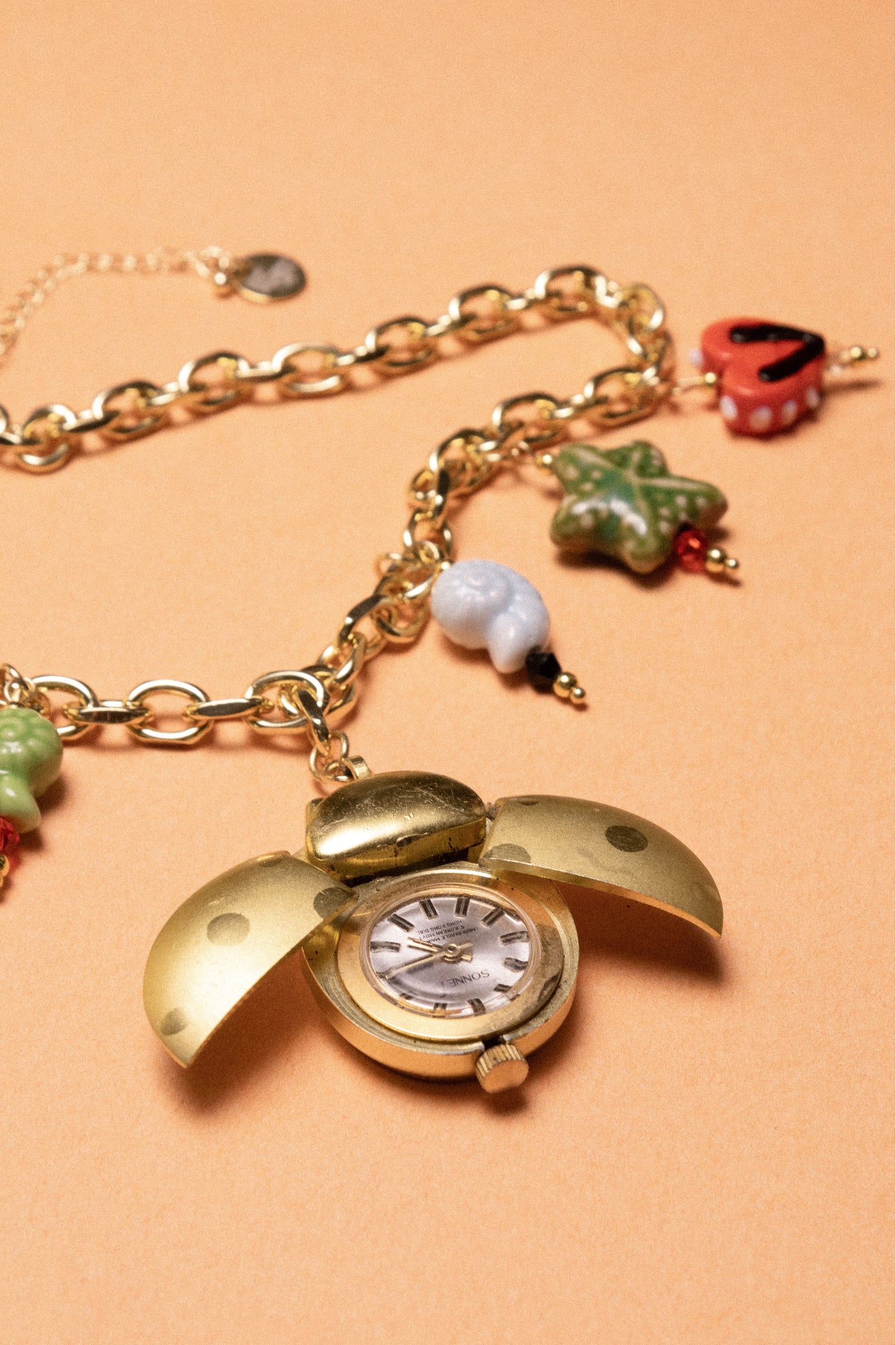Buzzing Watch Charm Necklace