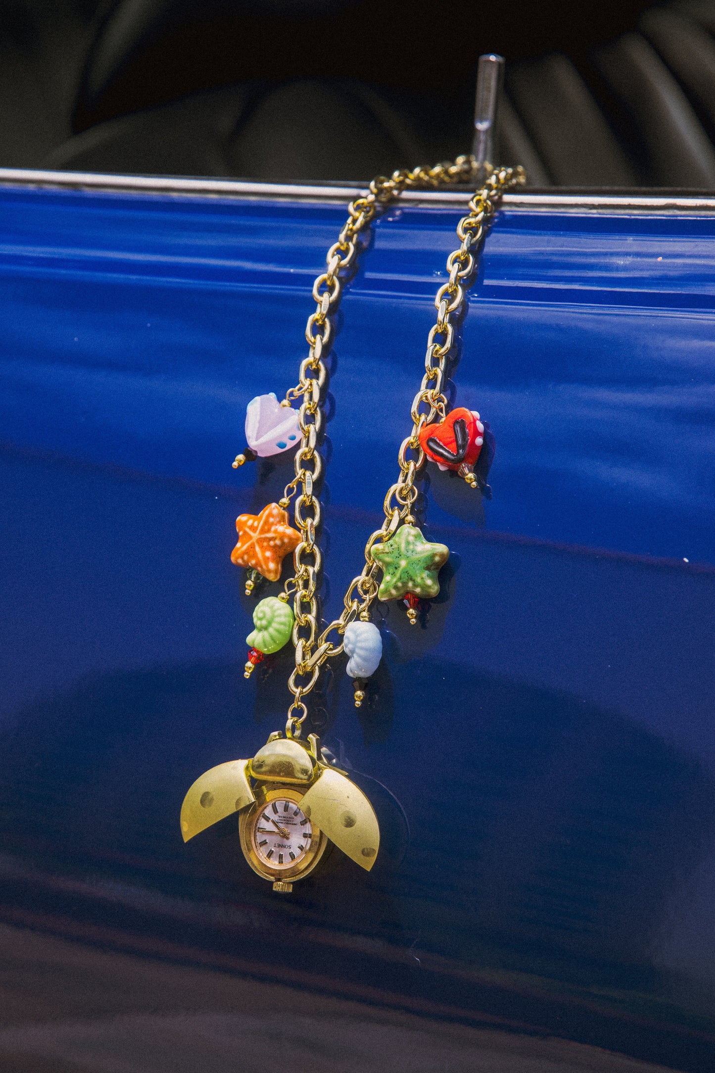 Buzzing Watch Charm Necklace