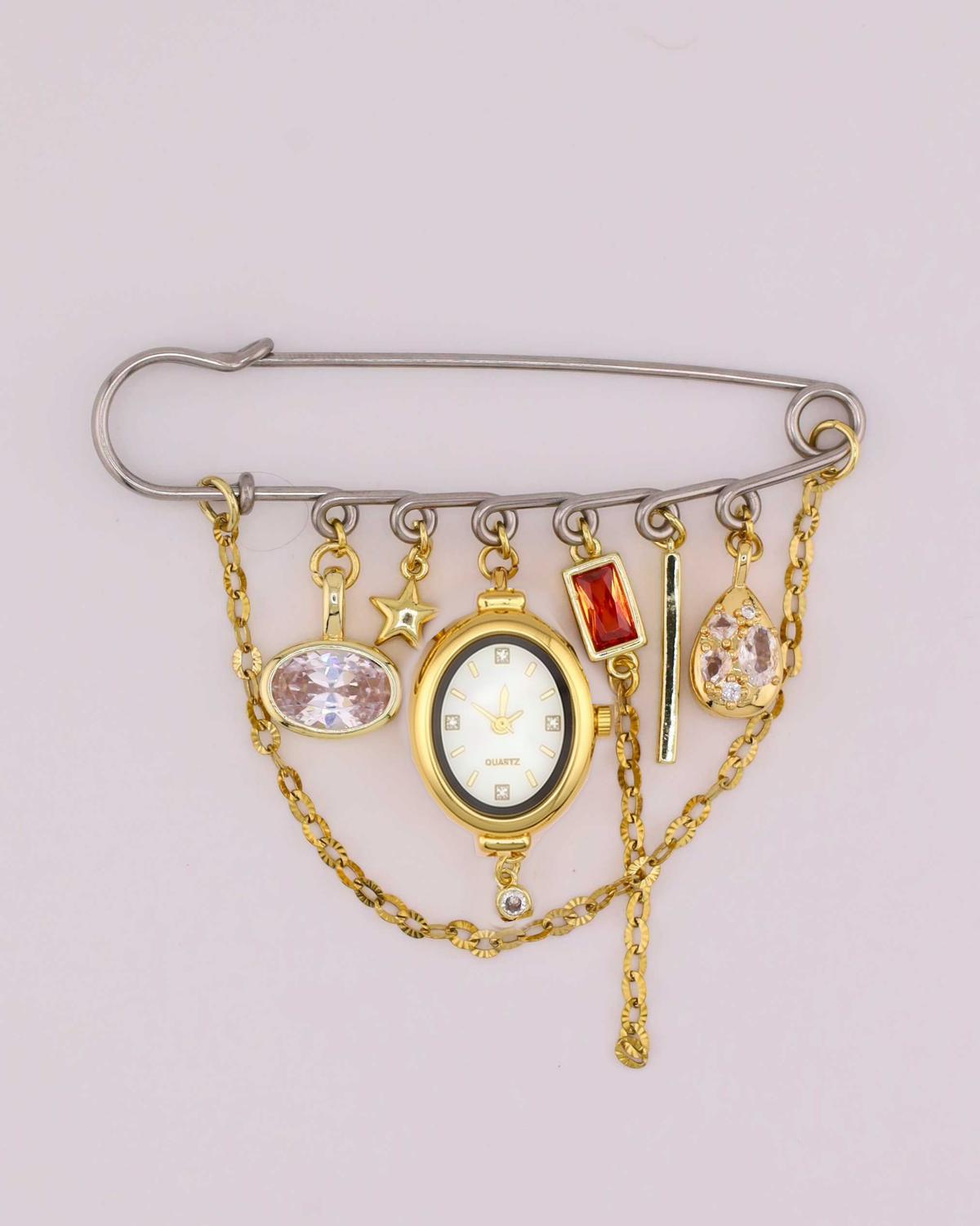 La Isla Watch Brooch — Option D, silver pin with oval gold watch, red crystal and teardrop charm