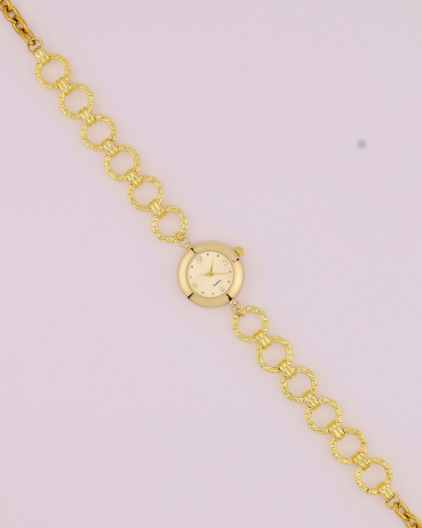 Luna Watch Choker in an all-gold tone with circular-link chain and watch centerpiece